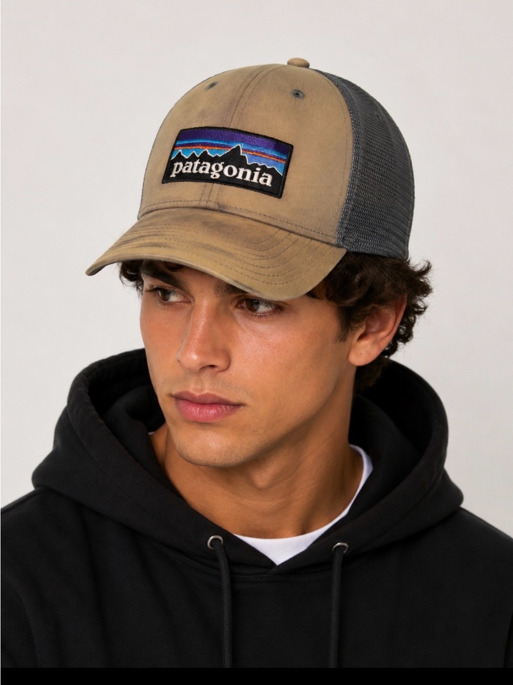 Patagonia Tan Front Trucker Hat with Navy Mesh and Multicolor Logo Sweat brim